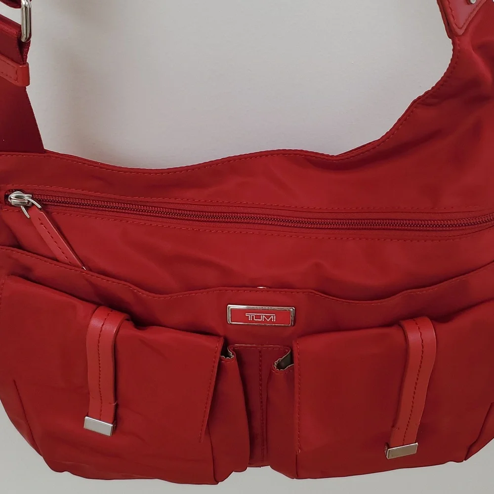 Tumi Pucket E/W Flap Crossbody Messenger Bag in Red with Silver Hardware